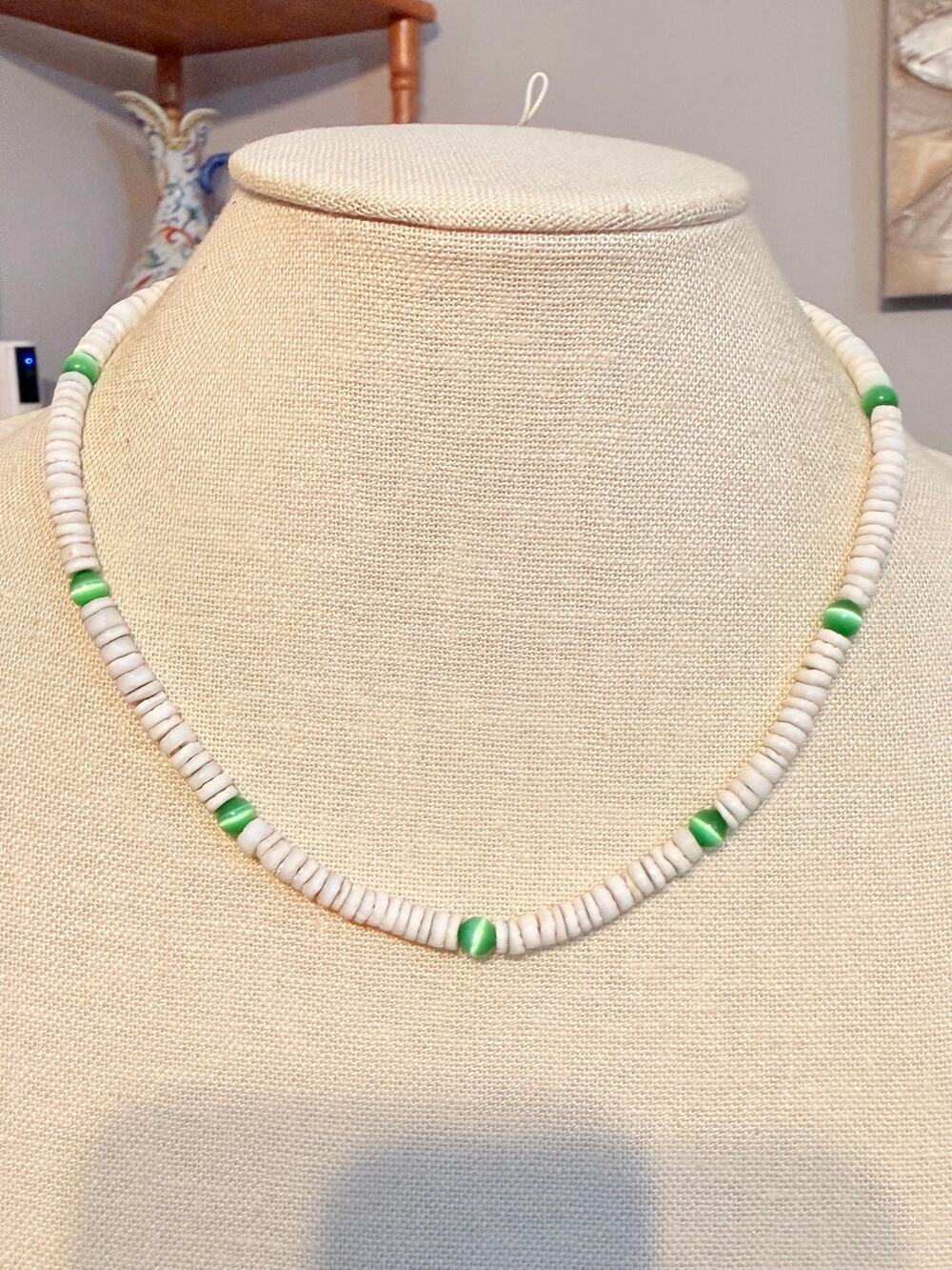 18" Shell Necklace with Green Cat’s Eye Beads